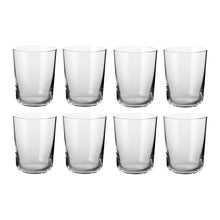Set of eight clear Scandinavian water glasses with a classic cylindrical shape, showcasing minimalist design by Frederik Bagger.