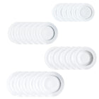 Sets of white porcelain plates with subtle textured edges in a Scandinavian minimal design style