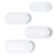 Sets of white porcelain plates with subtle textured edges in a Scandinavian minimal design style