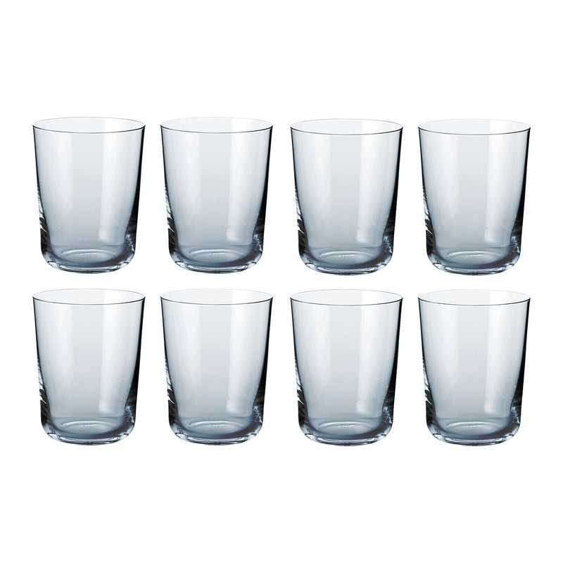 Set of eight clear Scandinavian design water glasses with a classic cylindrical shape and minimalist finish.